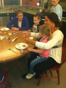 Jenny Gorski and her new friend decorate cookies together.