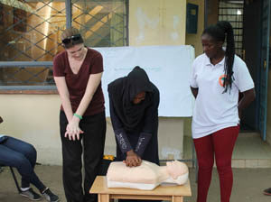 trainee learning cpr compressions